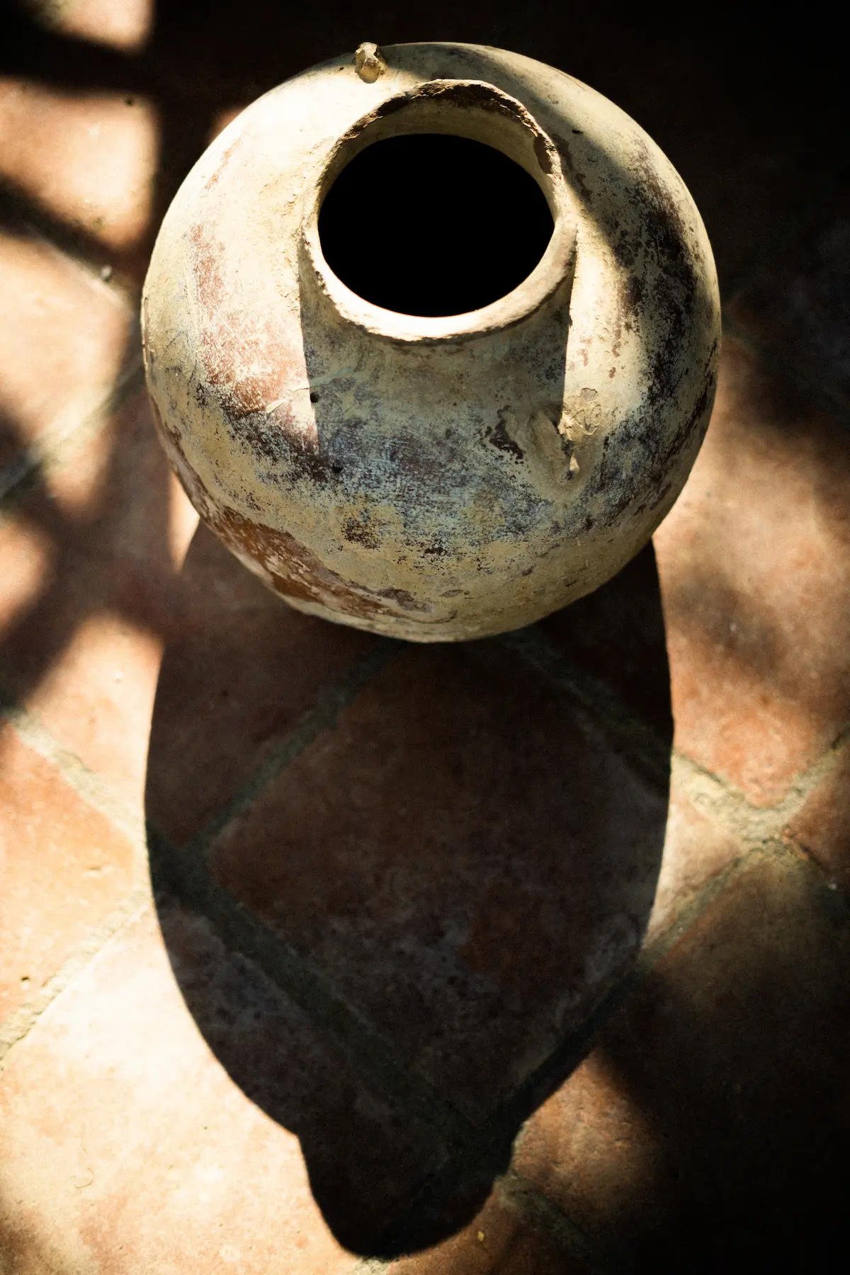 An antique ceramic pot. 