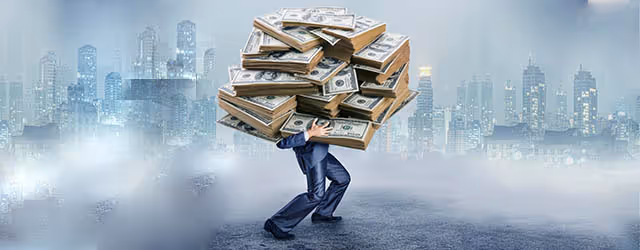 man-holding-cash-1436197665