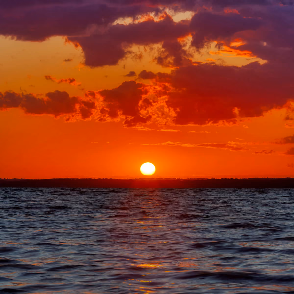 a beautiful sunset over a lake