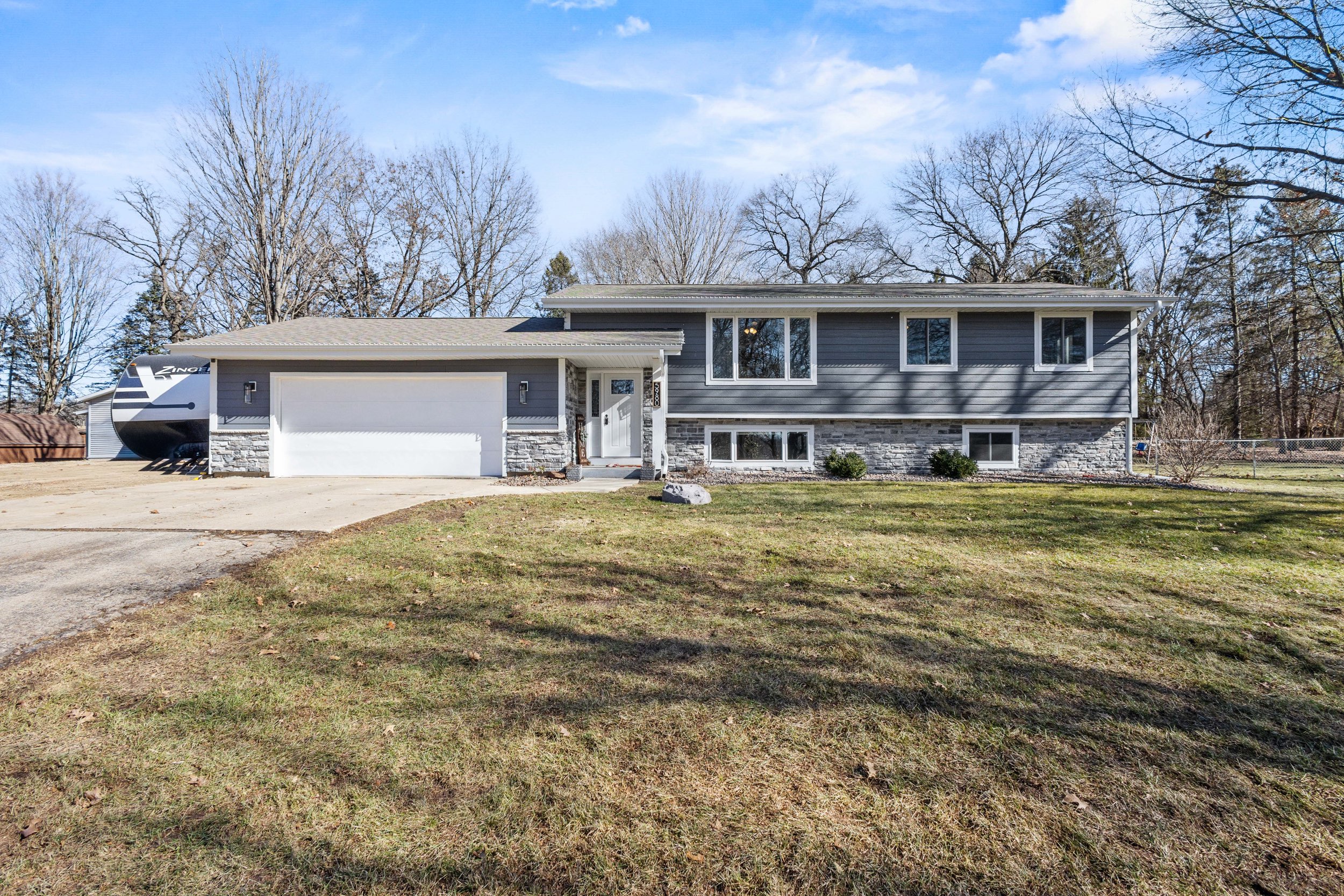 Updated Home with Heated Outbuilding & Private Backyard Oasis