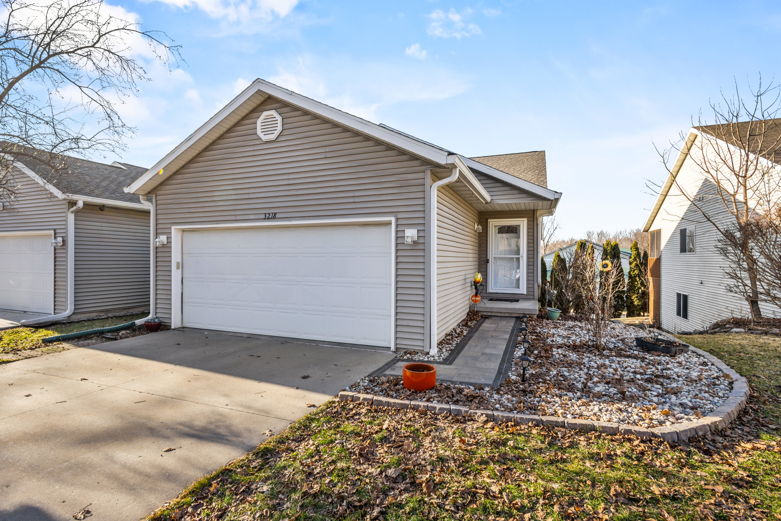 East Side Home with Vaulted Ceilings & Walk-Out Lower Level