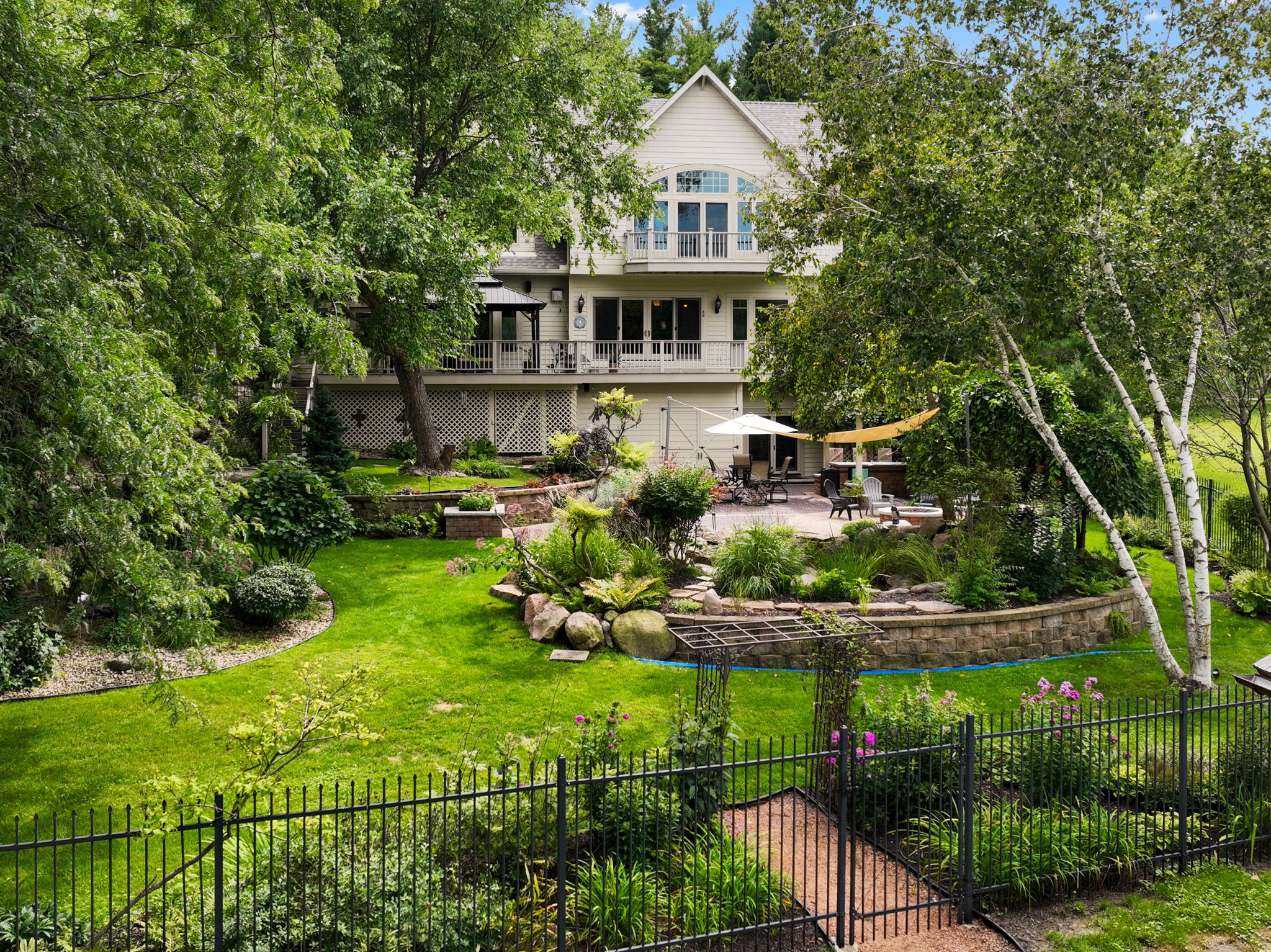Grand Waterfront Home with Private Dock, Pub Bar & Backyard Oasis