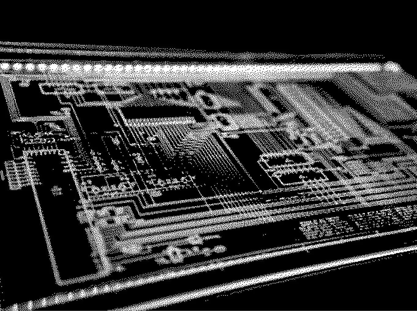 Close-up view of a computer motherboard with visible circuits and components.