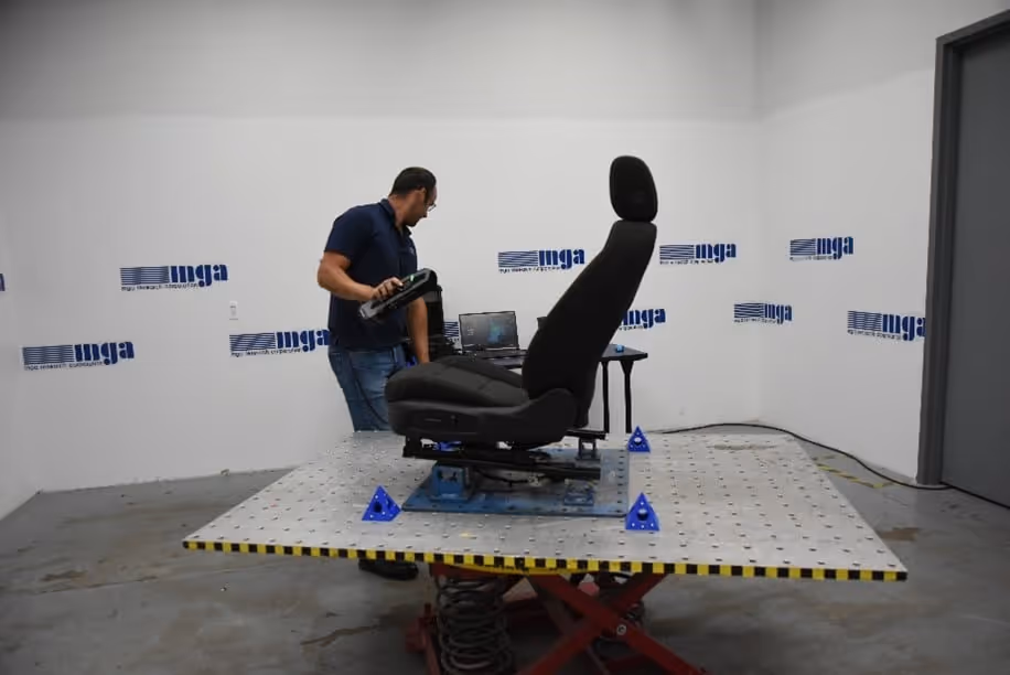 Image 1: MGA analysis expert performs scan on a car seat.