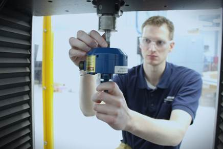 A person working on a machineAI-generated content may be incorrect.