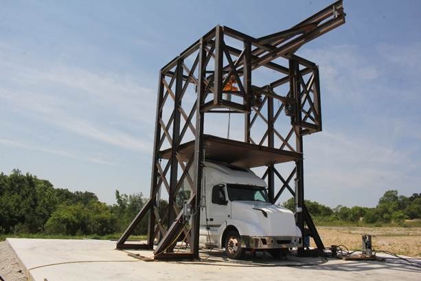 A truck with a craneDescription automatically generated with medium confidence