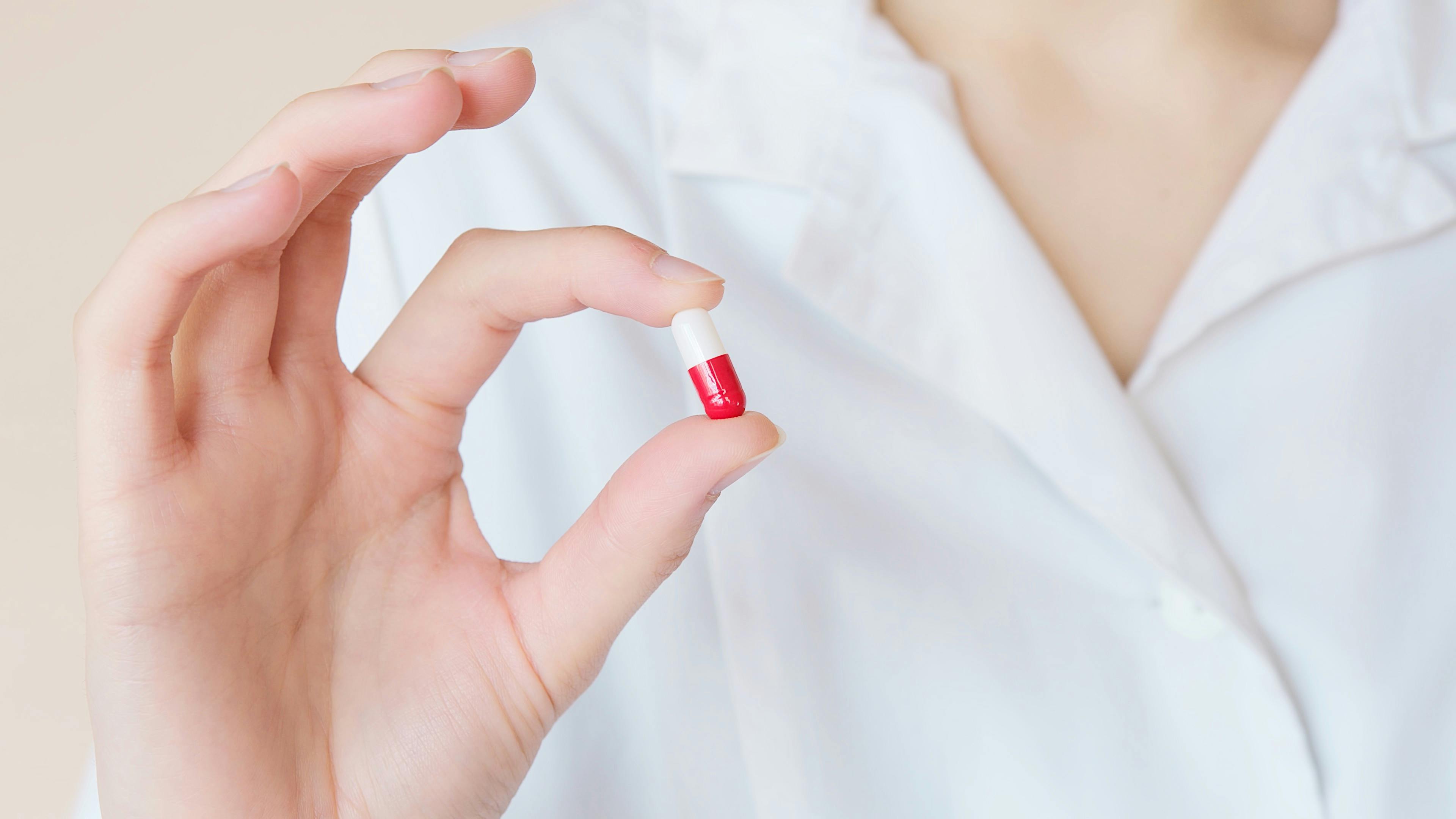 Antipsychotic medication tablets representing international prescribing options