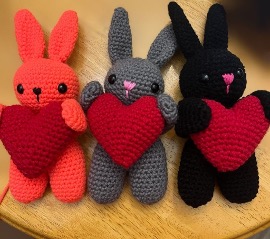 Hands working on a crochet project, illustrating hobbies that support mental health