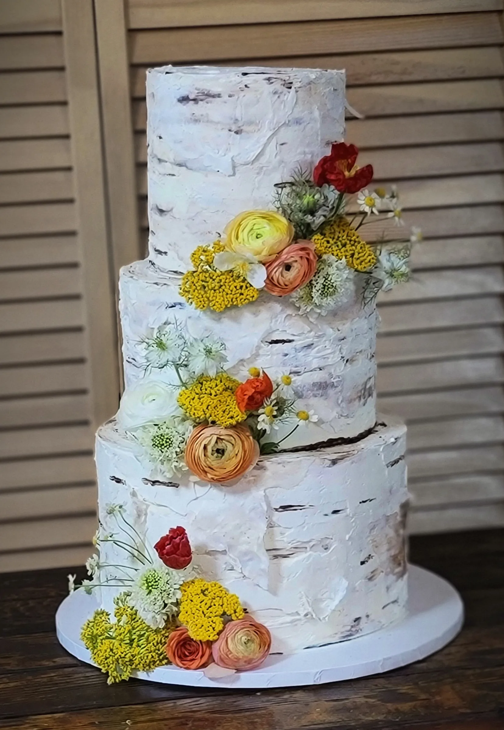 Birch tree-inspired wedding cake crafted by Bartleby & Sage's pastry chef for a woodland-themed celebration