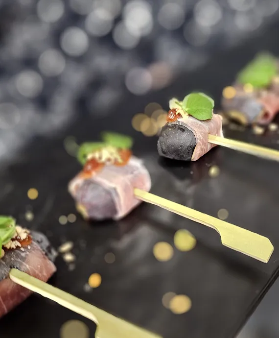 Canapes being passed around at a holiday party catered by Bartleby & Sage. 