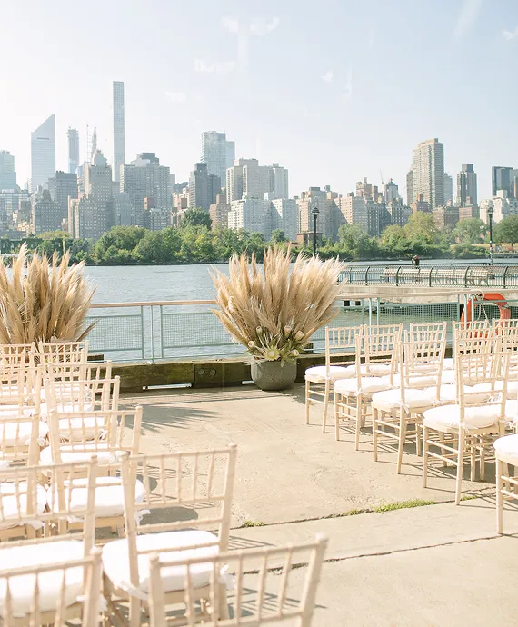A wedding set up by Bartleby & Sage on the Hudson that overlooks the NYC skyline. 