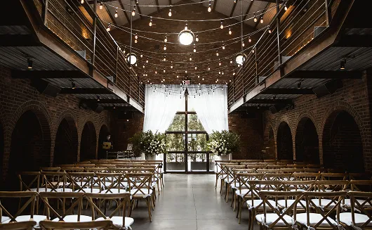 Wedding set-up inside a brick and steel building.