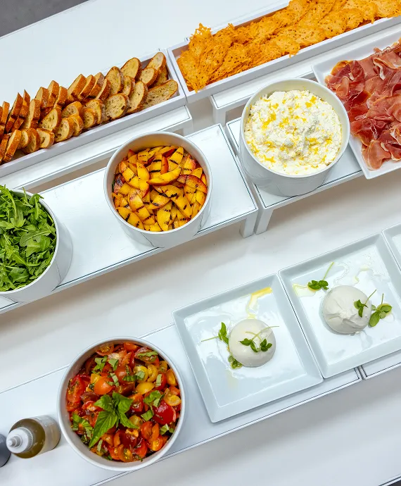 A burrata station set up for a corporate event by Bartleby & Sage.