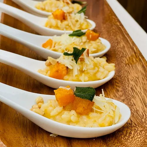 Pumpkin bites on individual spoons made by Bartleby & Sage.