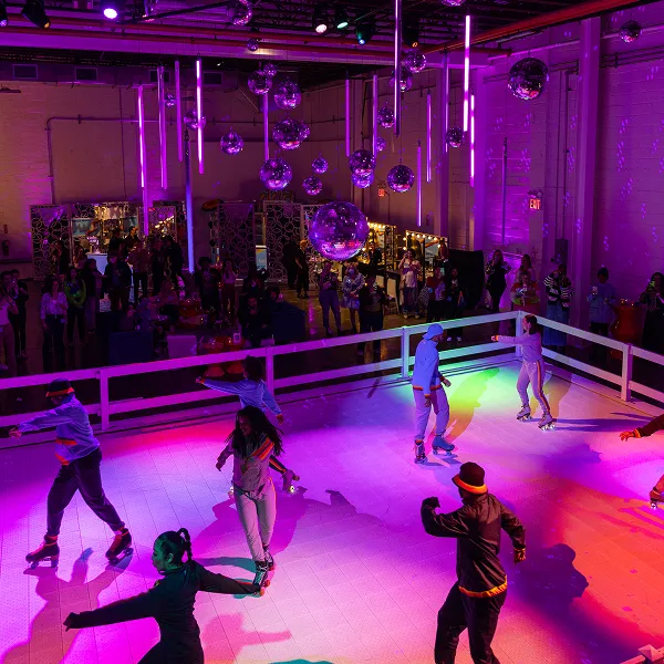 A roller skating event planned and catered by Bartleby & Sage. 