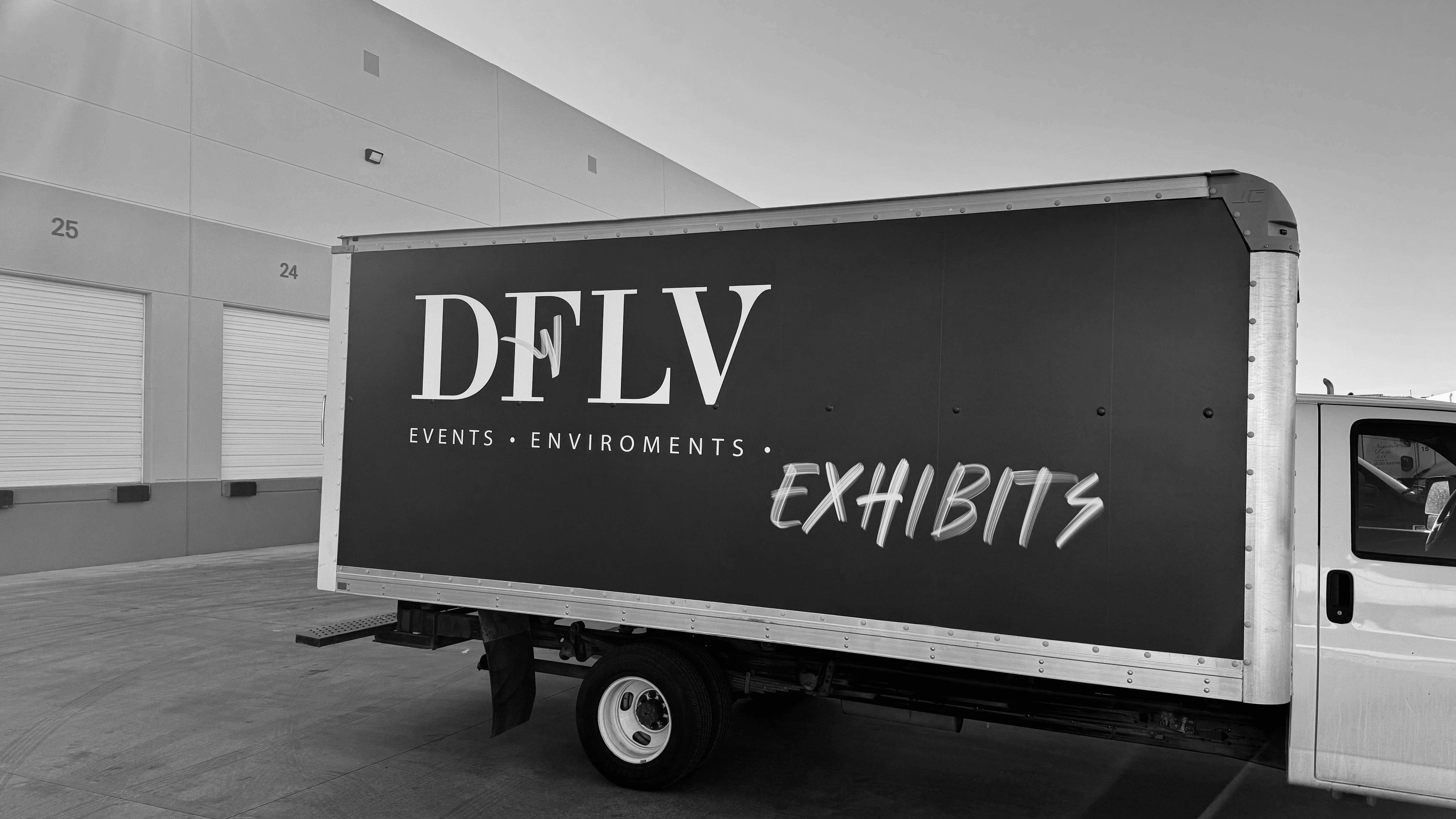 Trade show booth logistics and delivery team staging an exhibit for install