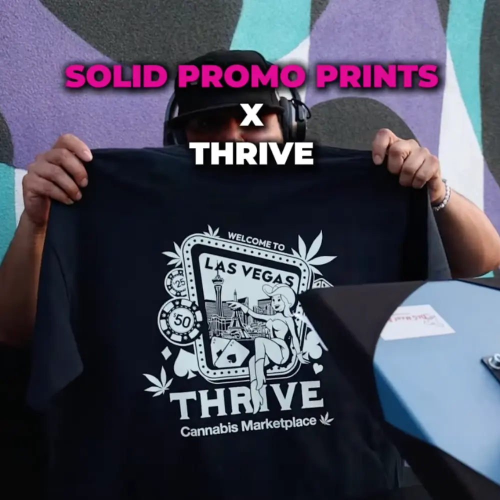 Custom T-shirt with Las Vegas graphic, Solid Promo Prints screen printing services for cannabis marketplace branding.