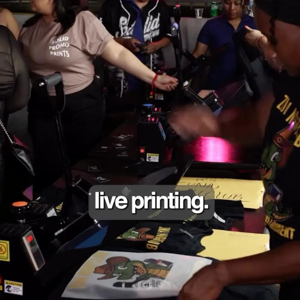 Live screen printing event with custom T-shirt printing, on-demand apparel printing services at events.