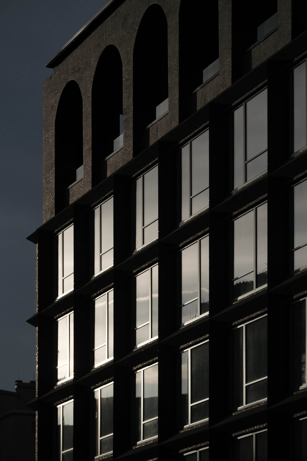 A very tall building with lots of windows.