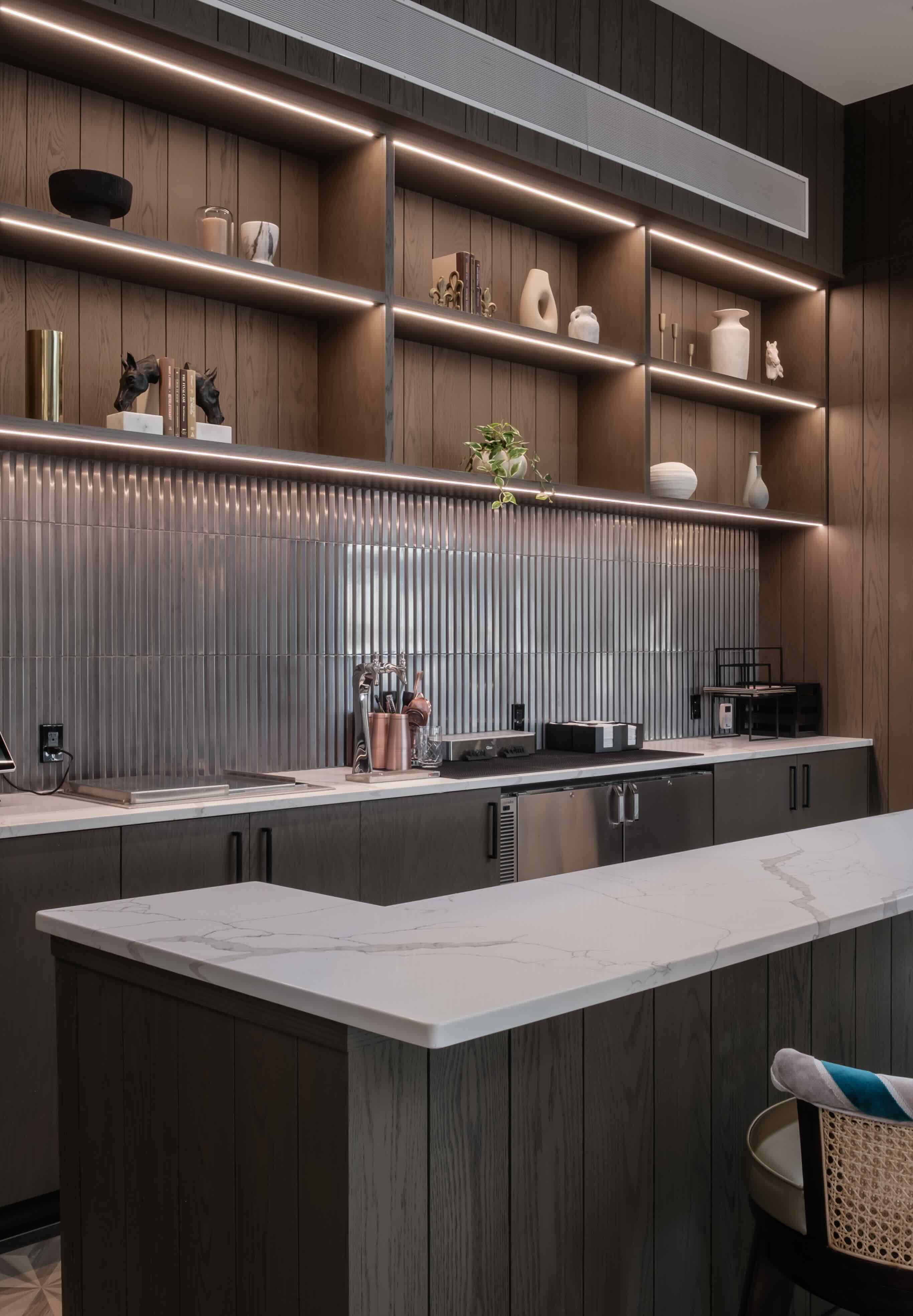A kitchen with a counter top and a sink.
