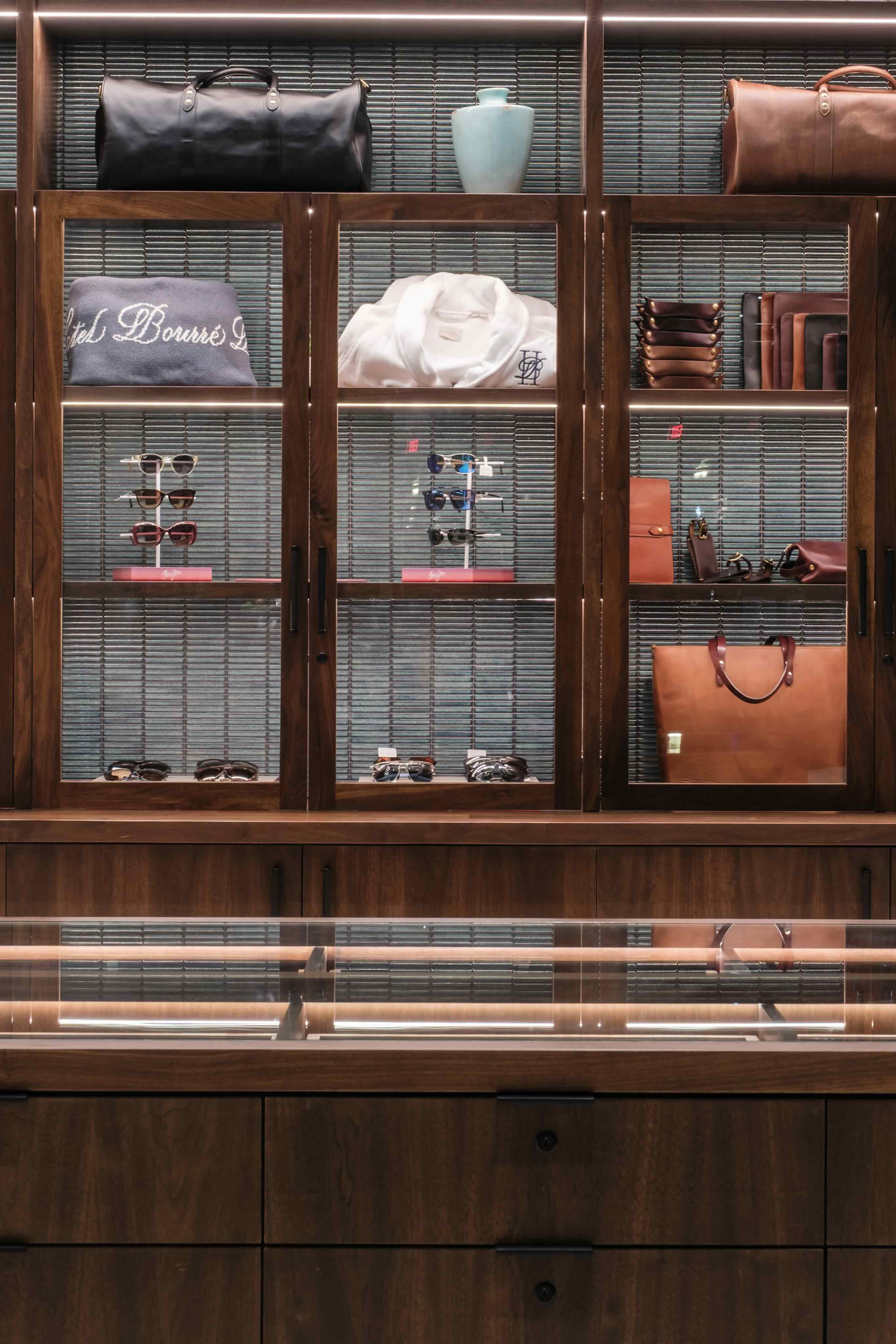 A display case filled with lots of luggage.