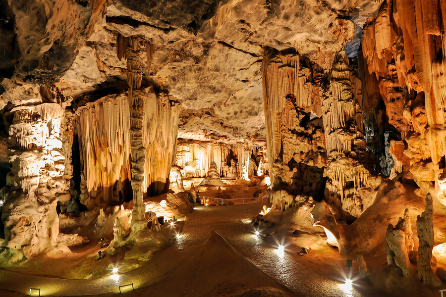 A large cave filled with lots of cave like formations.