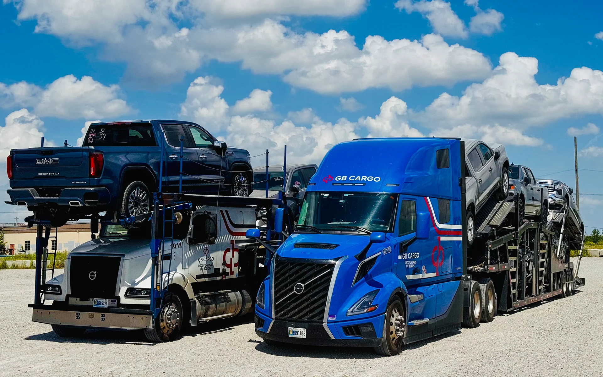 Two GB Cargo car hauling trucks loaded with cars in the process of fleet relocation.
