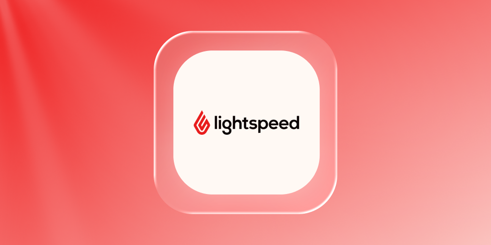 Retail store associate ringing up an order on a Lightspeed POS with connected systems indicators on screen