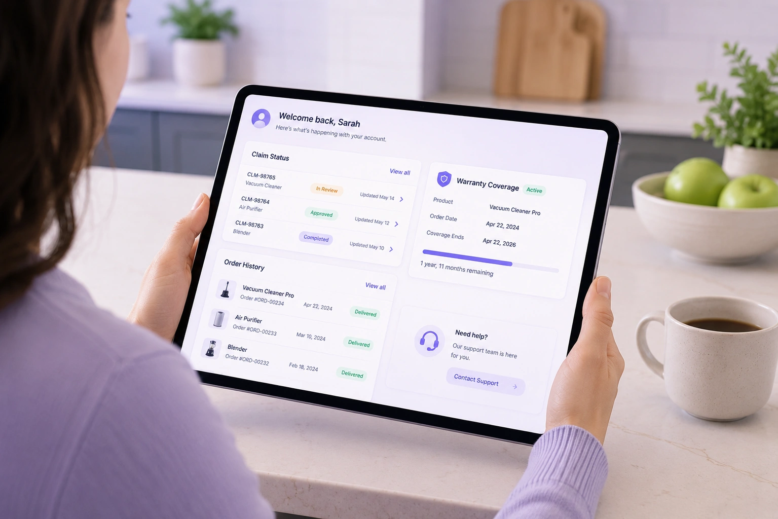 Laptop screen showing a customer portal with claim status, order history, and a return request in progress.