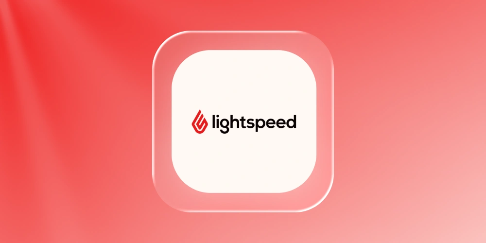 Retail store associate ringing up an order on a Lightspeed POS with connected systems indicators on screen