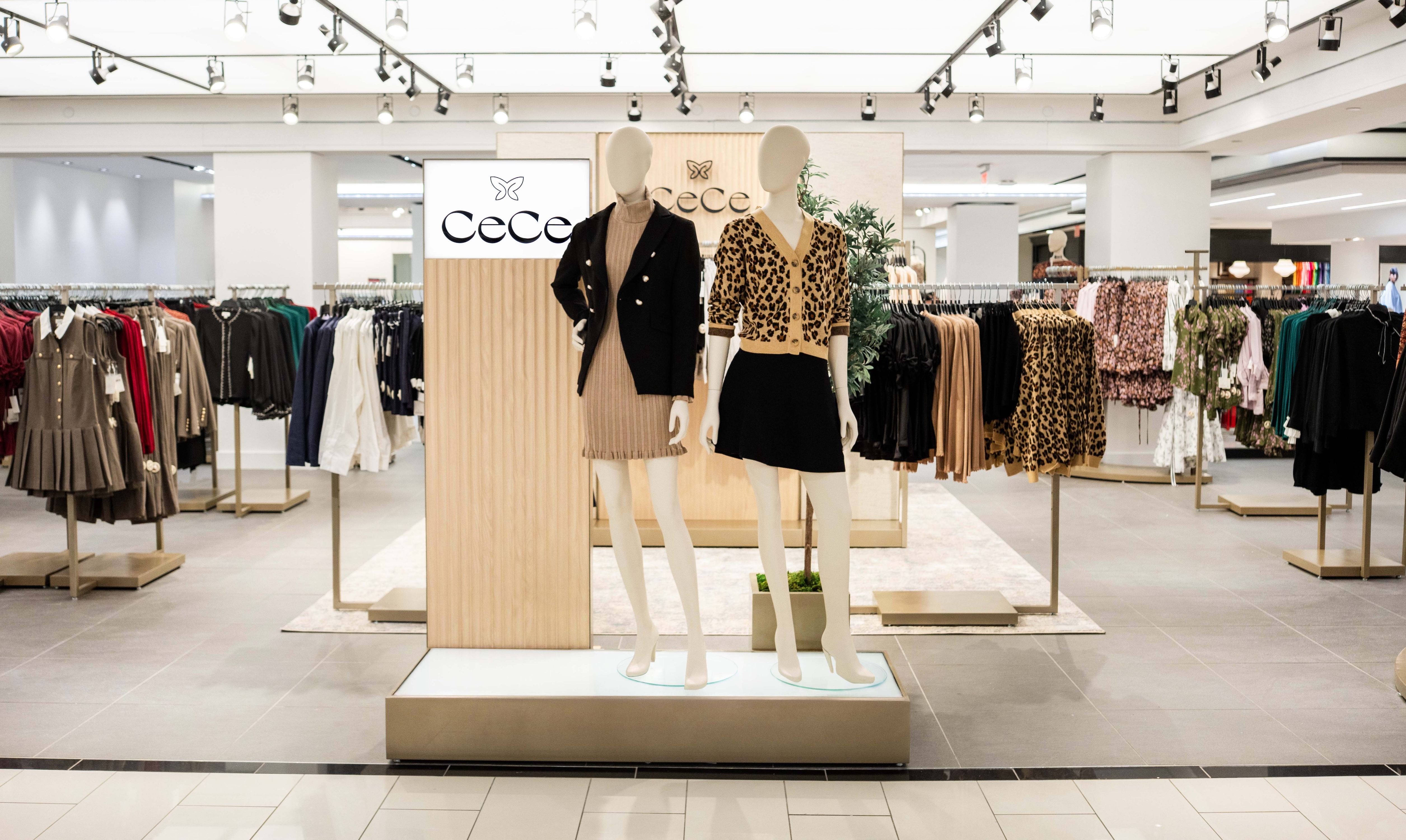 A clothing rack with clothes hanging on it.