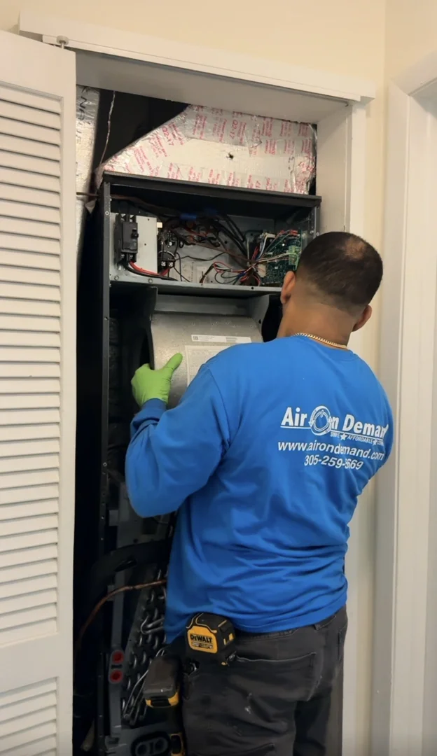 homeowner sliding a dirty dust caked air filter out of an AC unit - ac not cooling properly what to check homeowner sliding a dirty dust caked air filter out of an AC unit - ac not cooling properly what to check