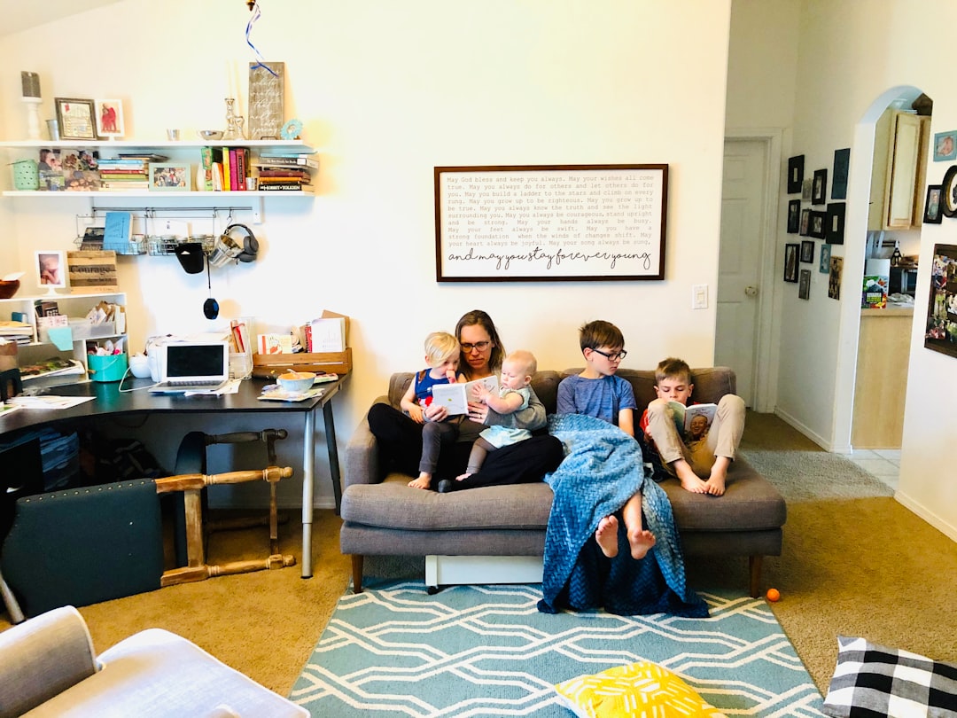 family relaxing in their living room - HVAC tune up service