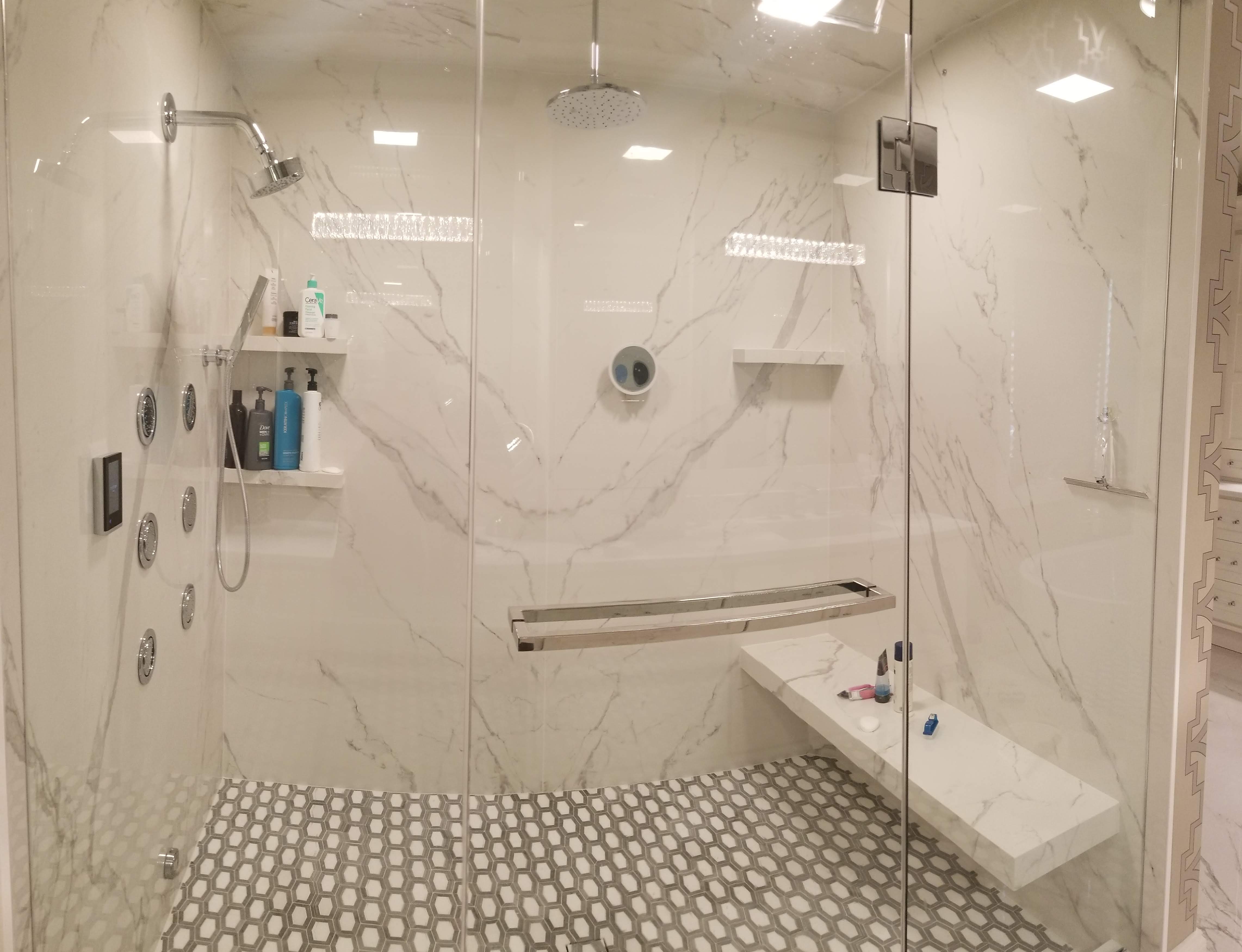 Custom tiled shower with bench and niche