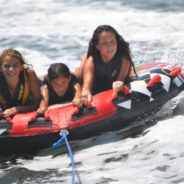 Family tubing with life jackets at Totally Tubular Watersports in Ocean City, NJ
