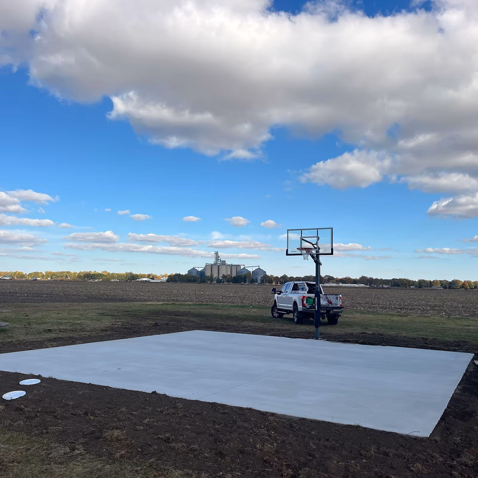 Custom outdoor basketball court design and concrete pour – FB Outdoor Services near me