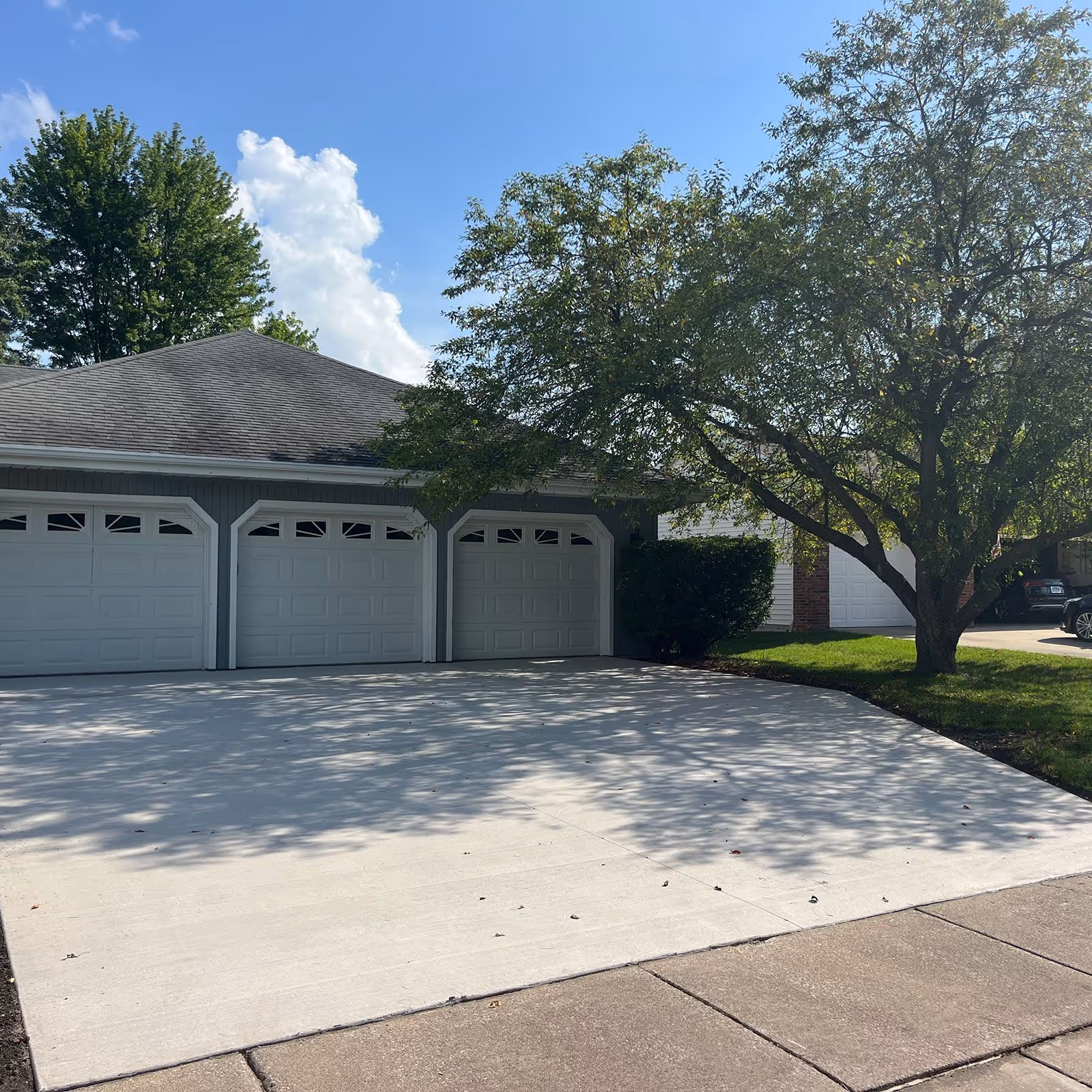 Modern concrete driveway with broom finish – FB Outdoor Services near me