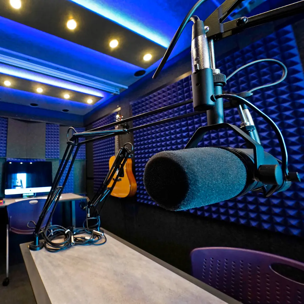 Boom arm microphone stand setup in a WhisperRoom voice over booth.