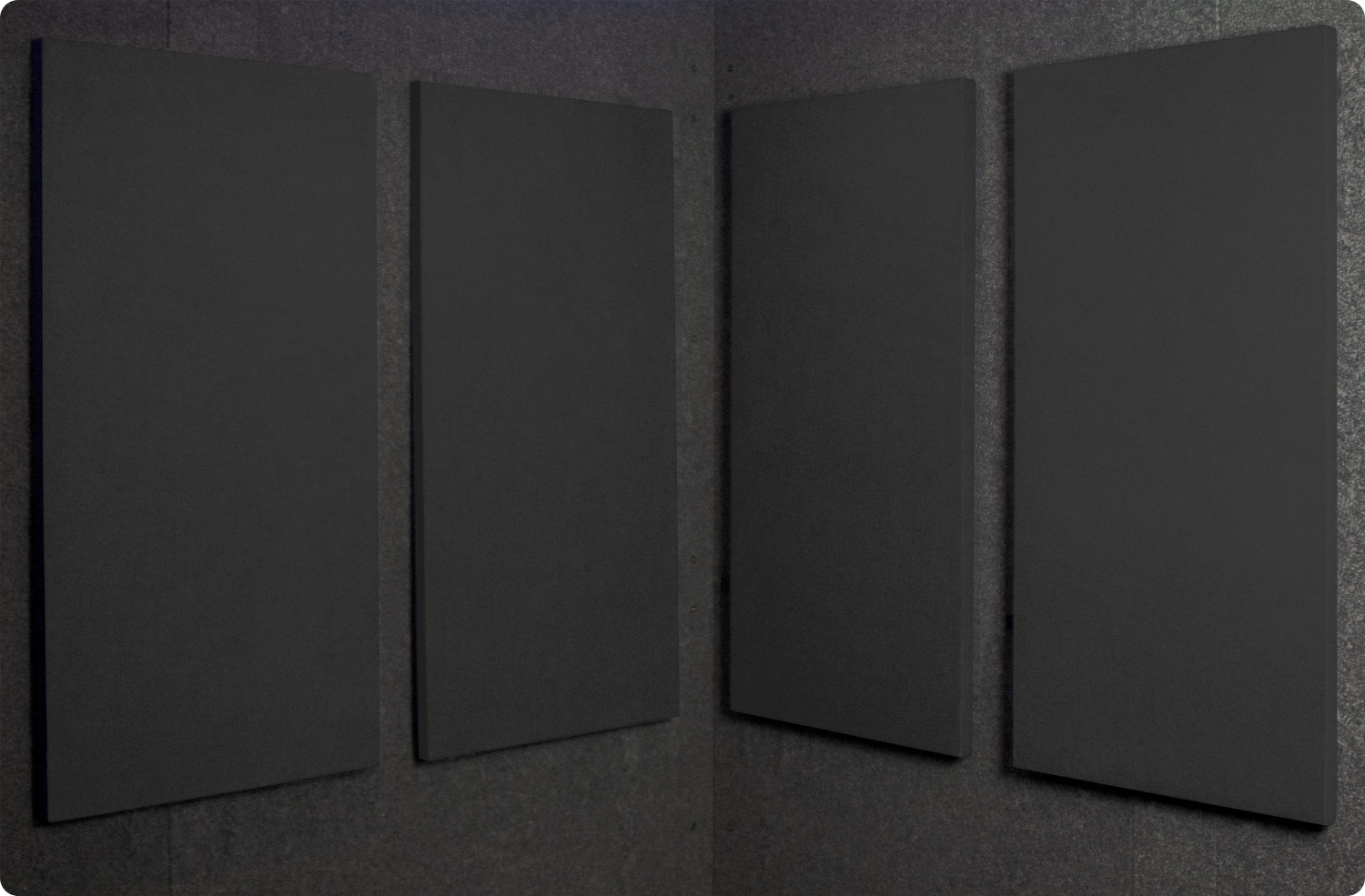 Graphite Audimute fabric acoustic panels installed inside a WhisperRoom sound booth, shown in a dark gray finish