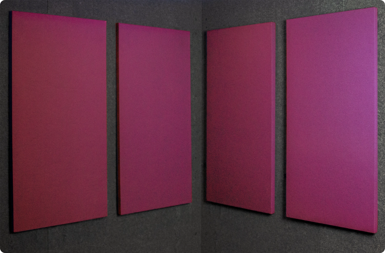 Orchid Audimute fabric acoustic panels installed inside a WhisperRoom sound booth, shown in a bold purple finish