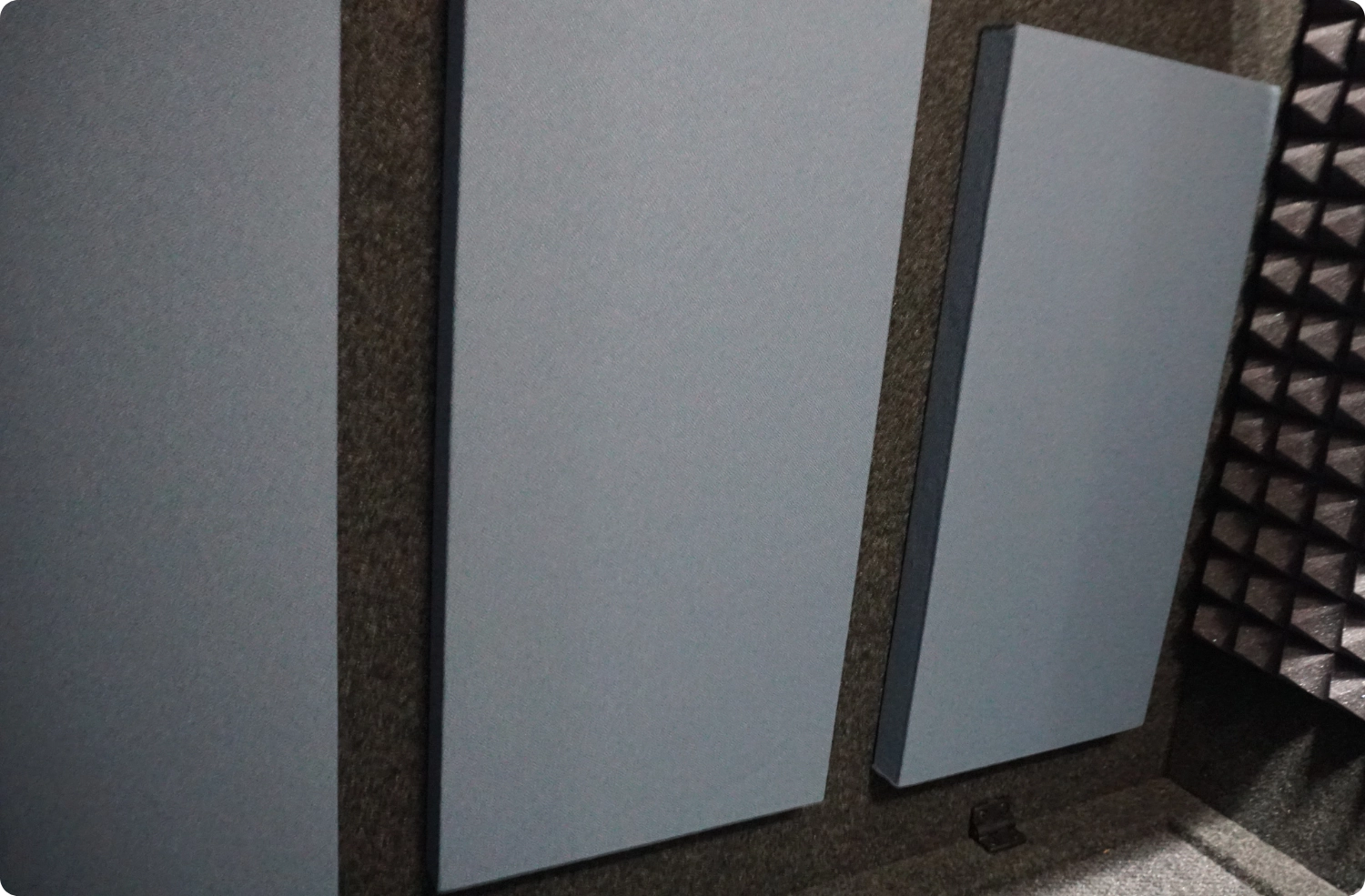 Quarry Blue Audimute acoustic panel texture and fabric finish inside a WhisperRoom booth