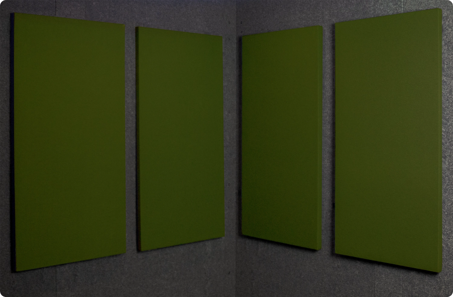 Fern Audimute fabric acoustic panels installed inside a WhisperRoom sound booth, shown in a deep green finish
