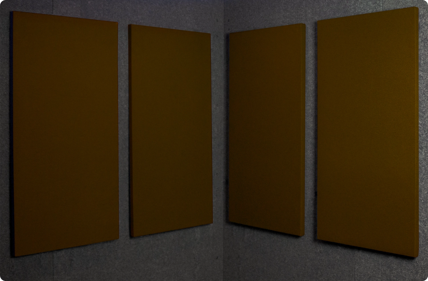 Coffee Bean Audimute fabric acoustic panels installed inside a WhisperRoom sound booth, shown in a dark brown finish