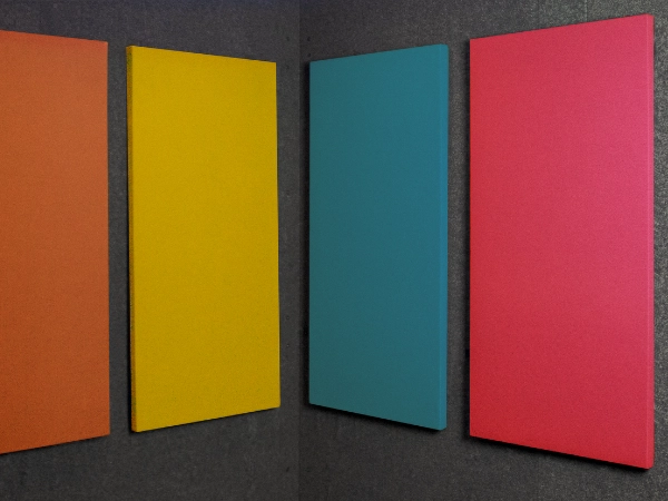 Woman signaling silence with a finger to her lips, representing the benefits of quietness for mental clarity and stress reduction.