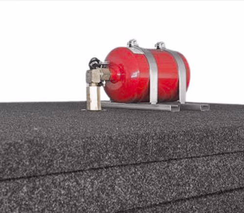 WhisperRoom FireGuard automatic fire suppression unit mounted on the roof of a sound isolation booth