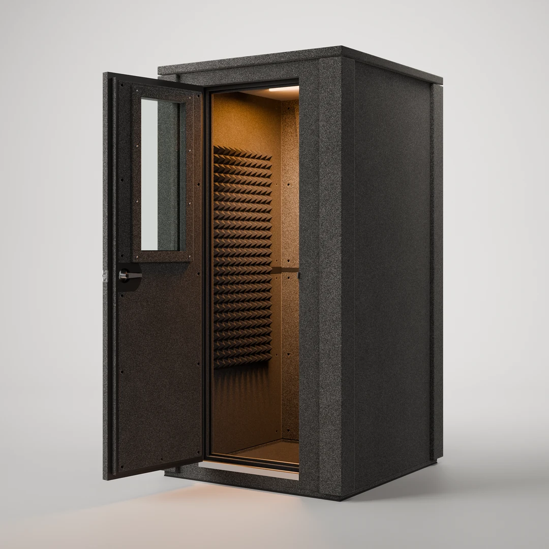 WhisperRoom MDL 4242 E 3.5' x 3.5' vocal booth shown open, its interior lit and treated with Studiofoam panels