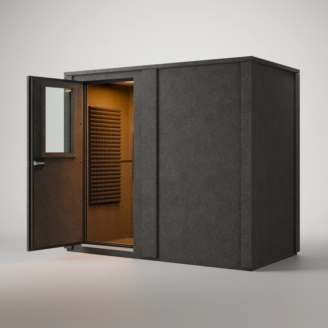 WhisperRoom MDL 4896 E double-wall isolation booth, open three-quarter view into the lit, foam-lined interior