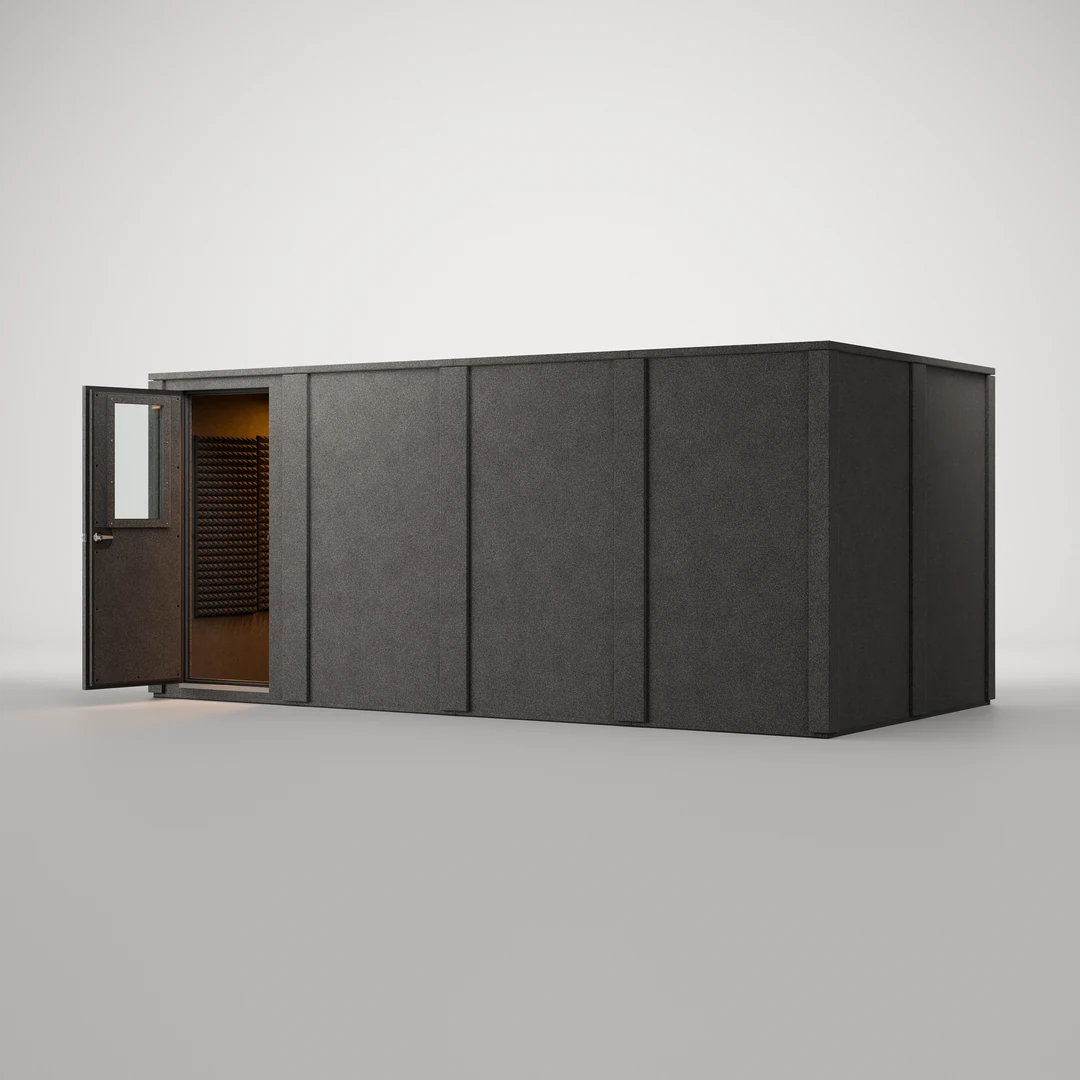 WhisperRoom MDL 96192 E 8' x 16' sound booth shown open, its interior lit and treated with Studiofoam panels