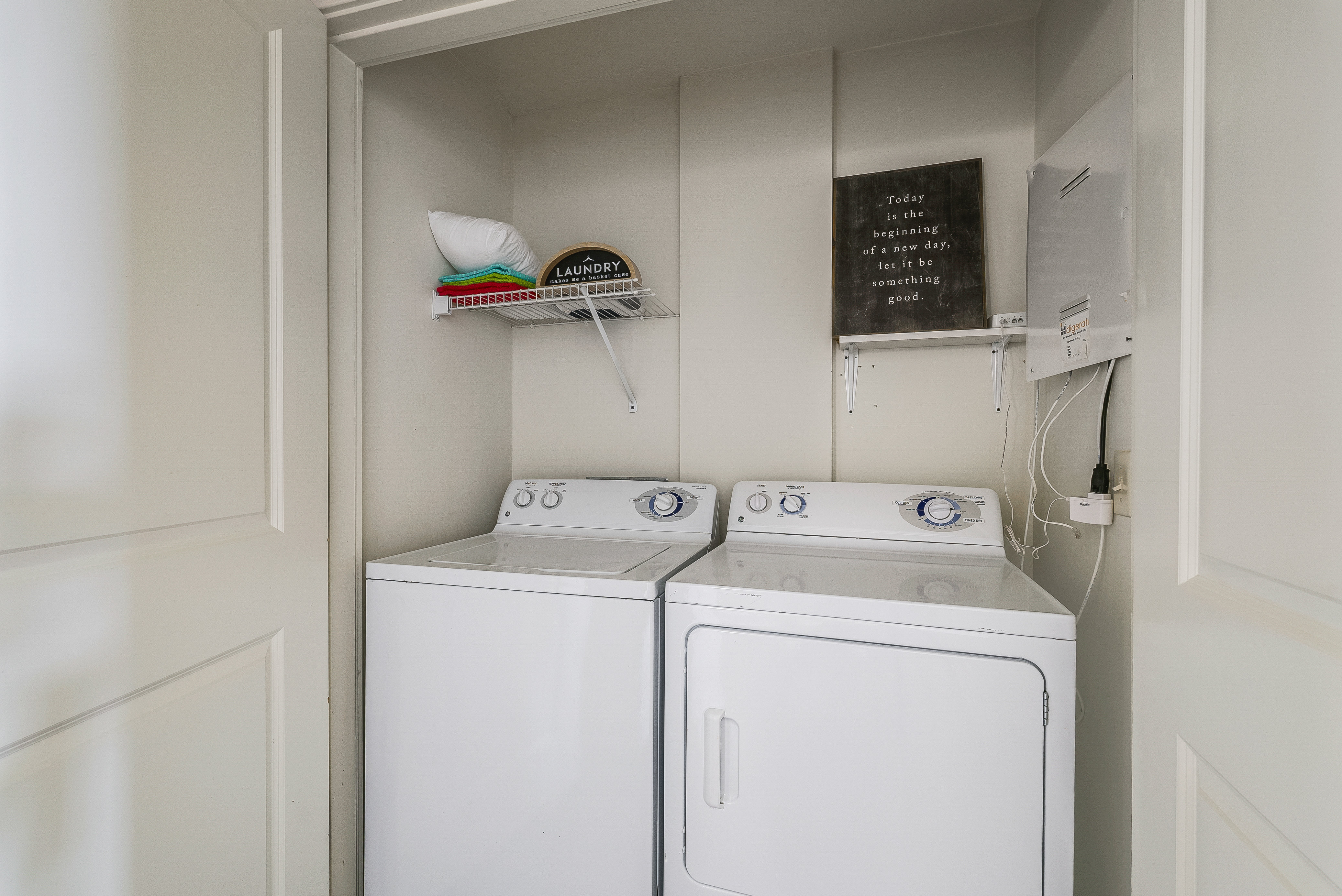 Laundry room with white appliances 