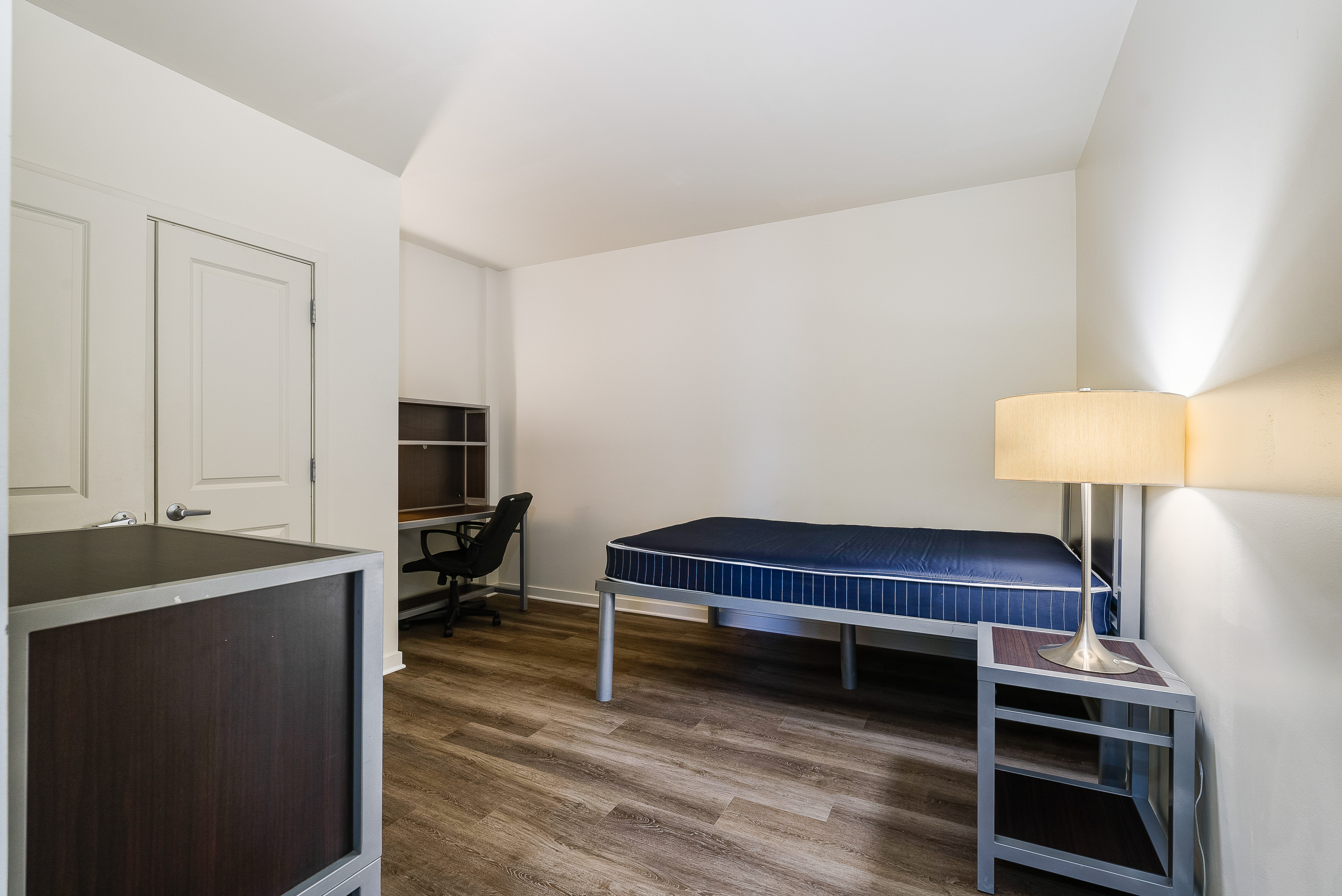 Bedroom with bed and lamp